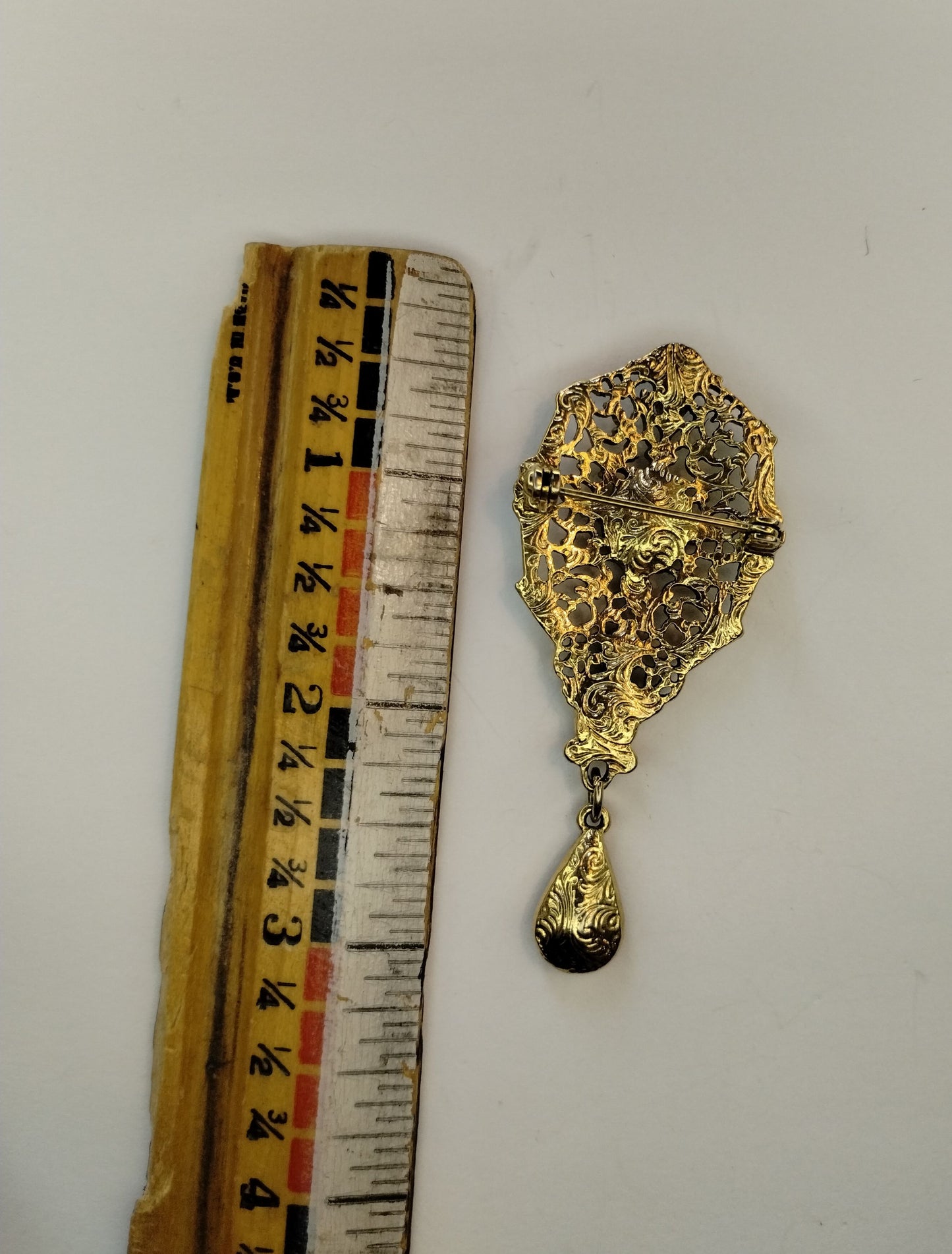 1928 Brand Gold Tone Blue Purple Pear French Cut Faceted Rhinestone Brooch Pin