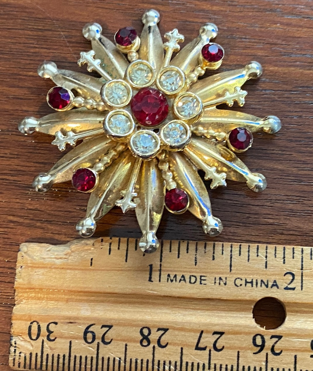 Vintage Goldtone Metal Starburst Red White Rhinestone Brooch Pin