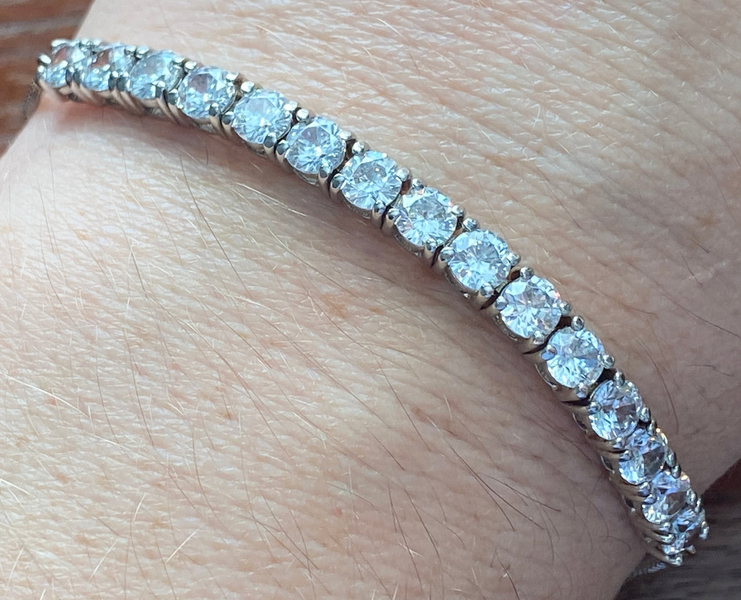 JCM Cubic Zirconia Silver Tone Metal Adjustable Slide Tennis Bracelet