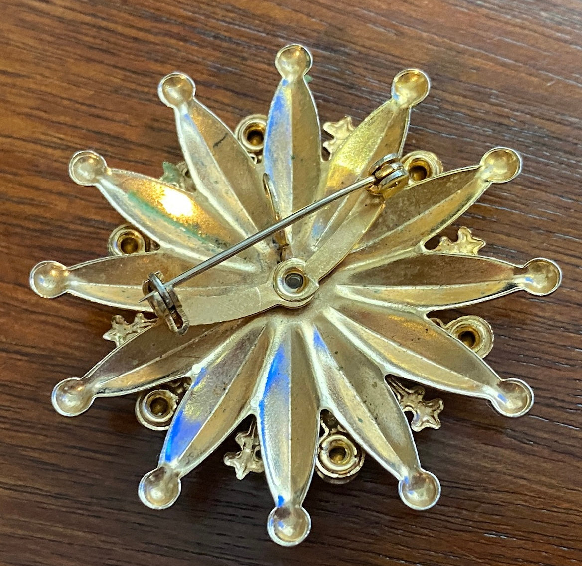 Vintage Goldtone Metal Starburst Red White Rhinestone Brooch Pin