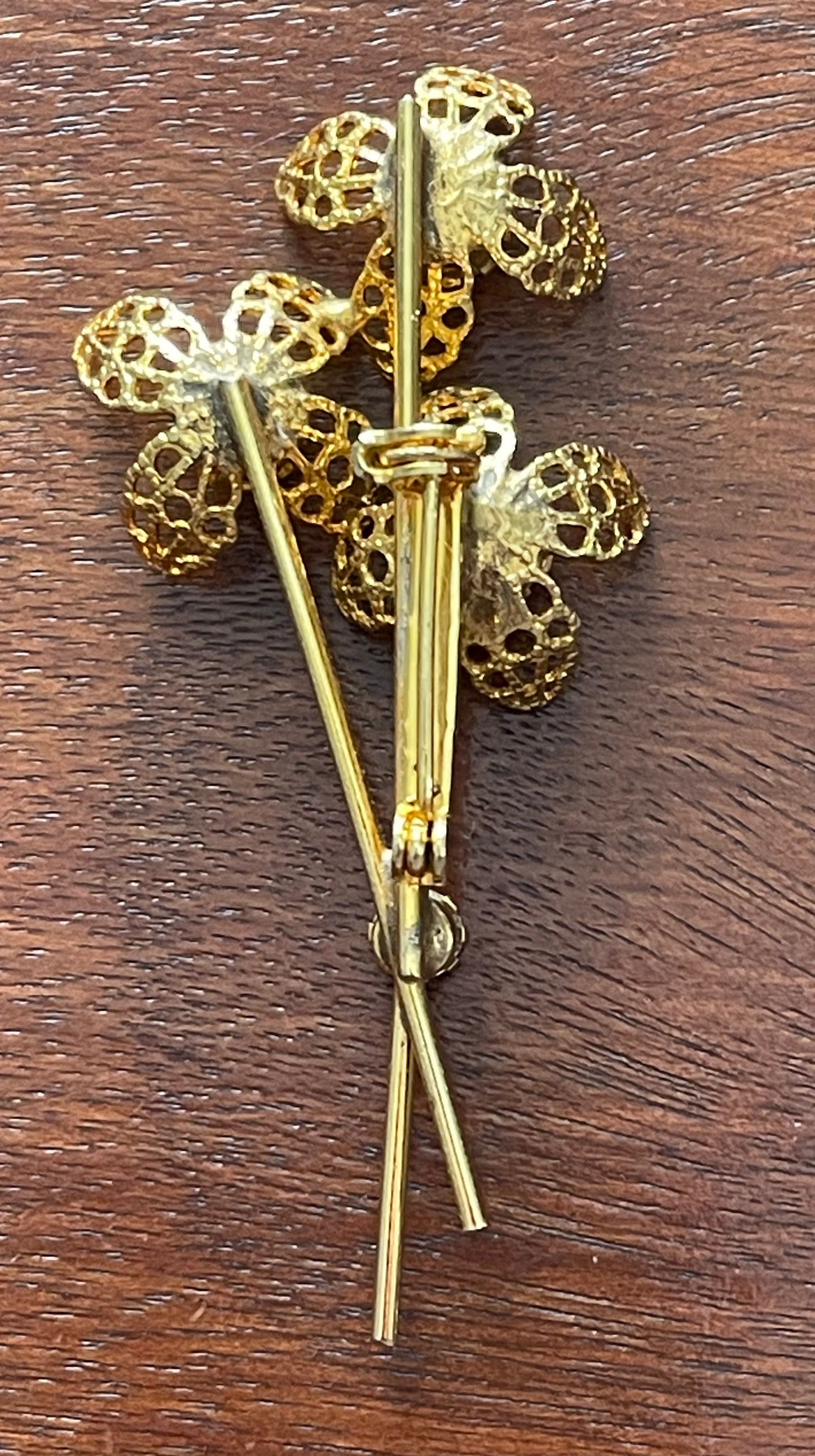 Vintage Gold Tone Metal Flower Brooch Pin w Green Rhinestones Stones