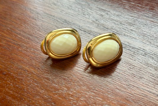 Vintage Joan Rivers Gold Tone Faceted White Cabochon Clip on Earrings