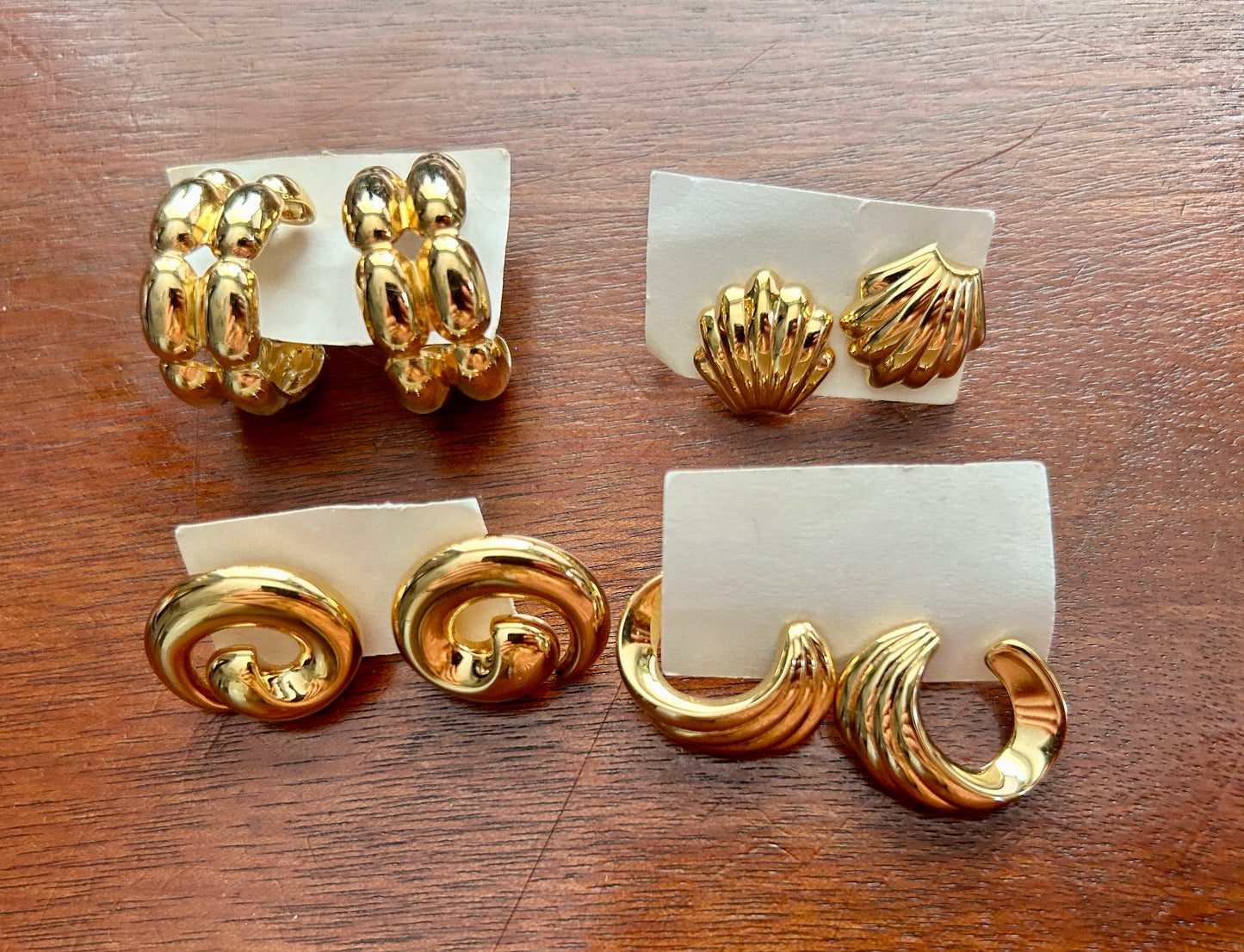 Lot of 4 Vintage Signed Monet Gold Tone Pierced Earrings Hoops Swirl Shell Clam