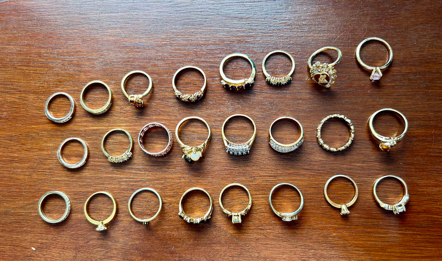 Lot of 24 Vintage to Now Gold Tone Plate Rings Rhinestone Engagement Bands Stone