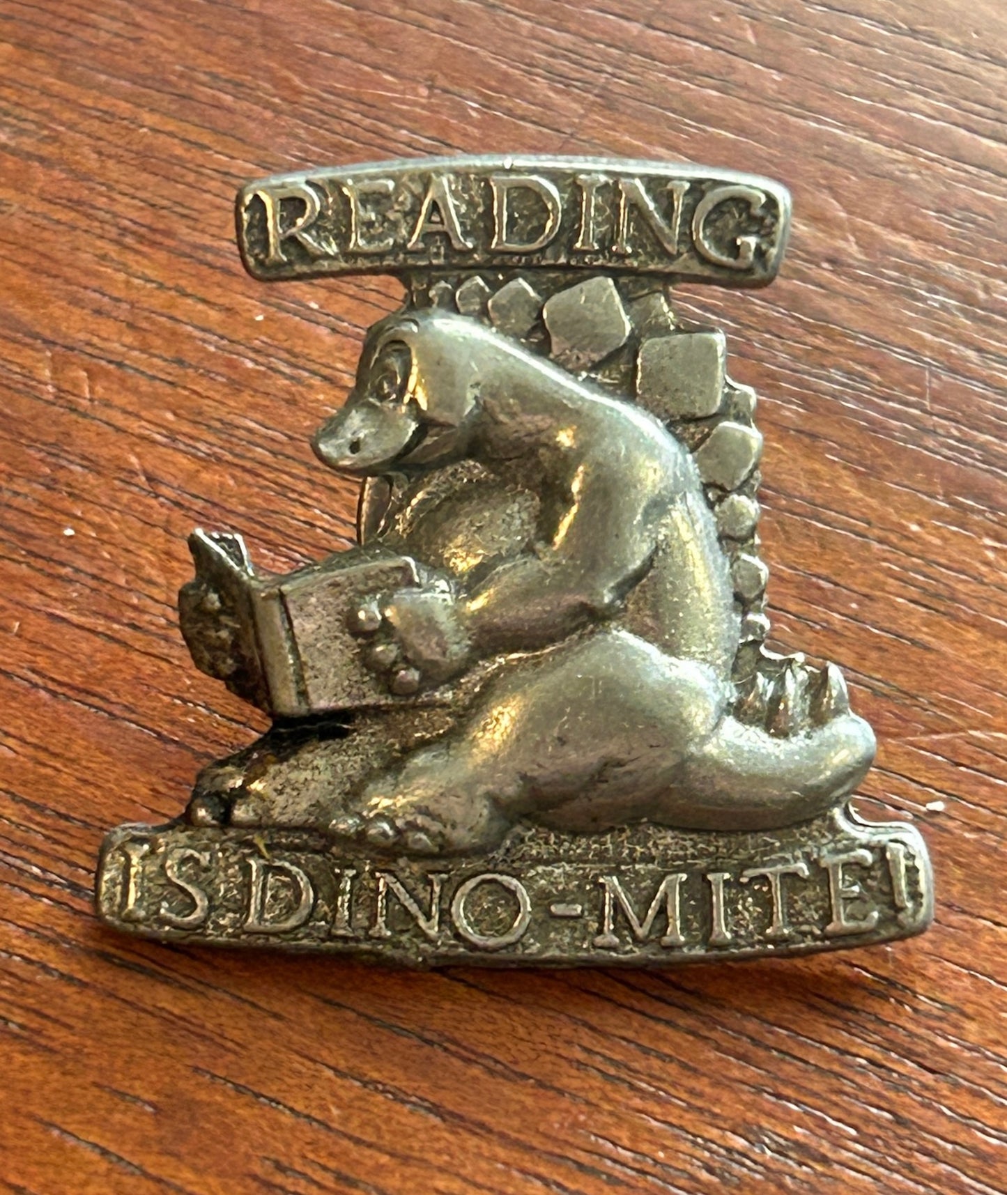 Vintage IFS "Reading is Dino-Mite" Silver Pewter Tone Dinosaur Lapel Pin Pinback
