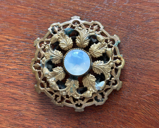 Vintage Round Filigree Gold Tone Brooch With Clear Milky Cabochon Stone