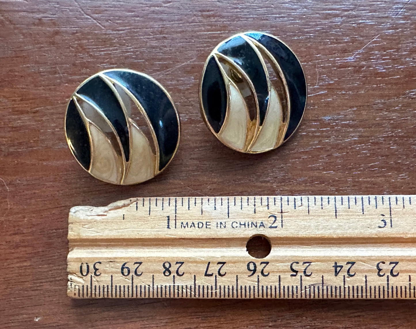 Vintage Crown Trifari Signed Round Black Cream Enamel Gold Cut Out Earrings