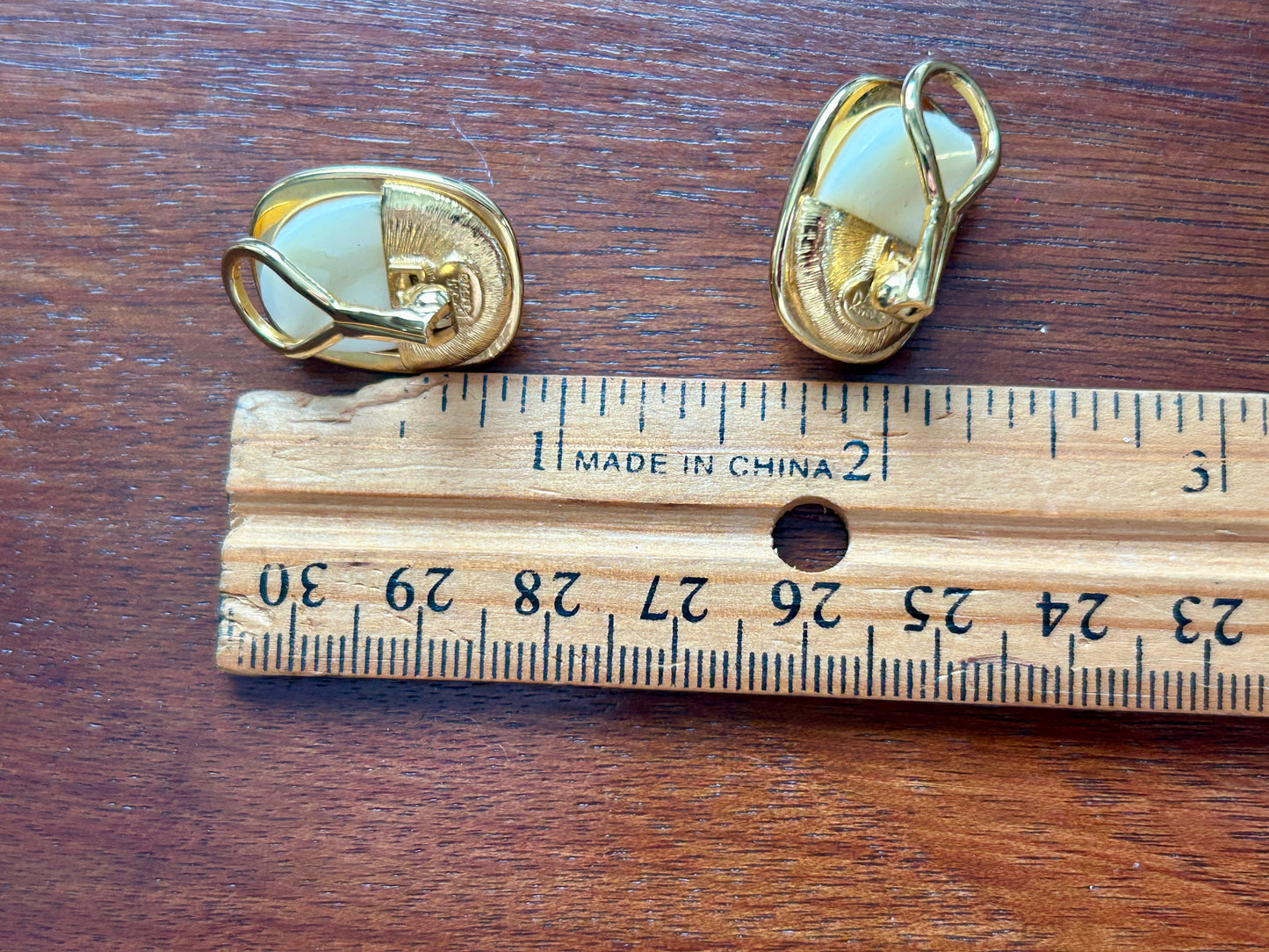 Vintage Joan Rivers Gold Tone Faceted White Cabochon Clip on Earrings