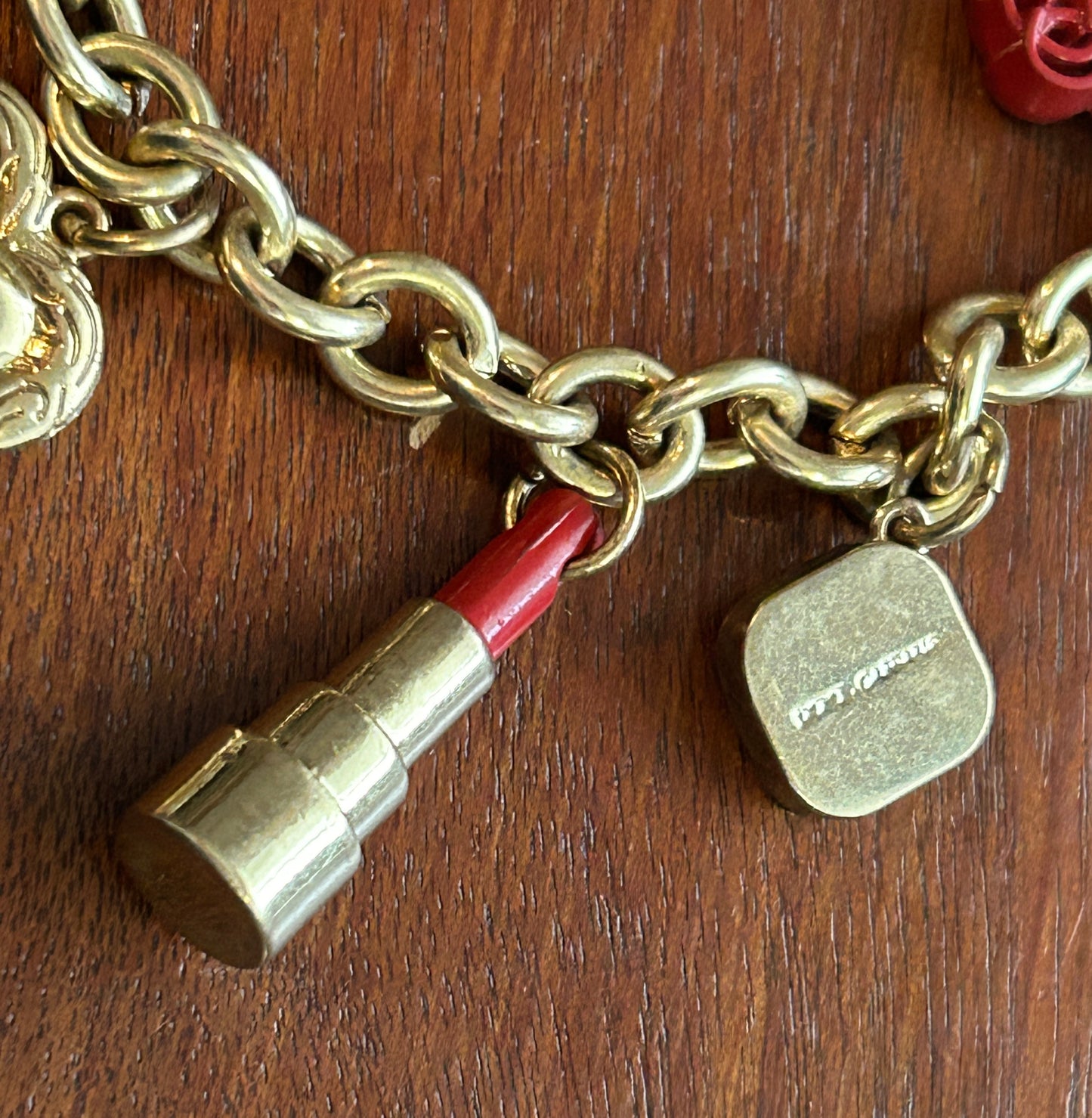 Dolce & Gabbana Golden Anklet Bracelet Trinket Lipstick Perfume Purse