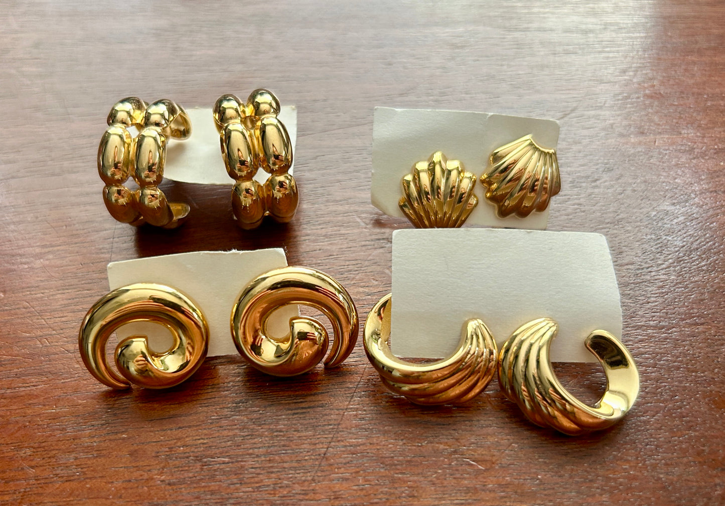 Lot of 4 Vintage Signed Monet Gold Tone Pierced Earrings Hoops Swirl Shell Clam