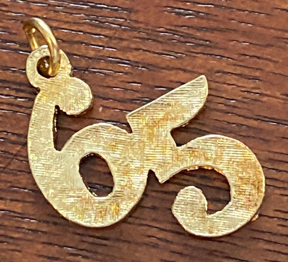 Gold Tone 65 Number Charm