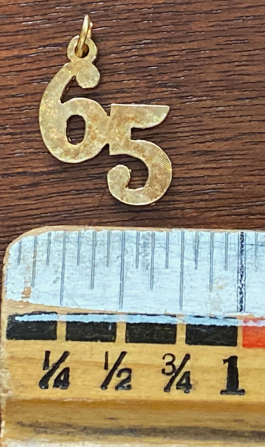 Gold Tone 65 Number Charm