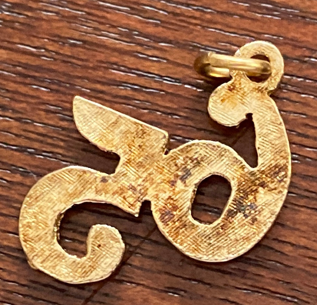 Gold Tone 65 Number Charm