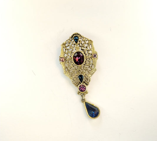 1928 Brand Gold Tone Blue Purple Pear French Cut Faceted Rhinestone Brooch Pin