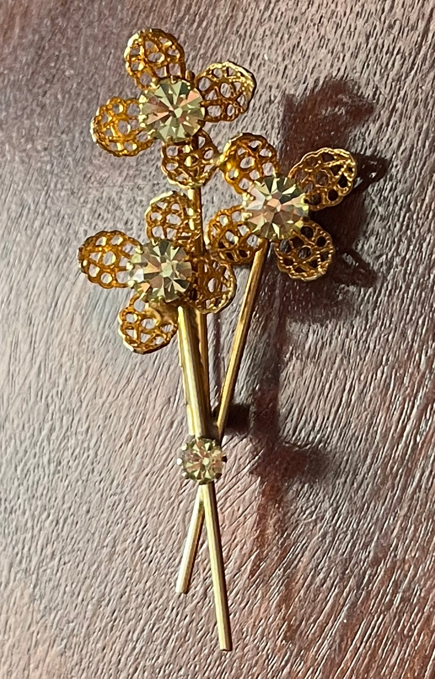 Vintage Gold Tone Metal Flower Brooch Pin w Green Rhinestones Stones