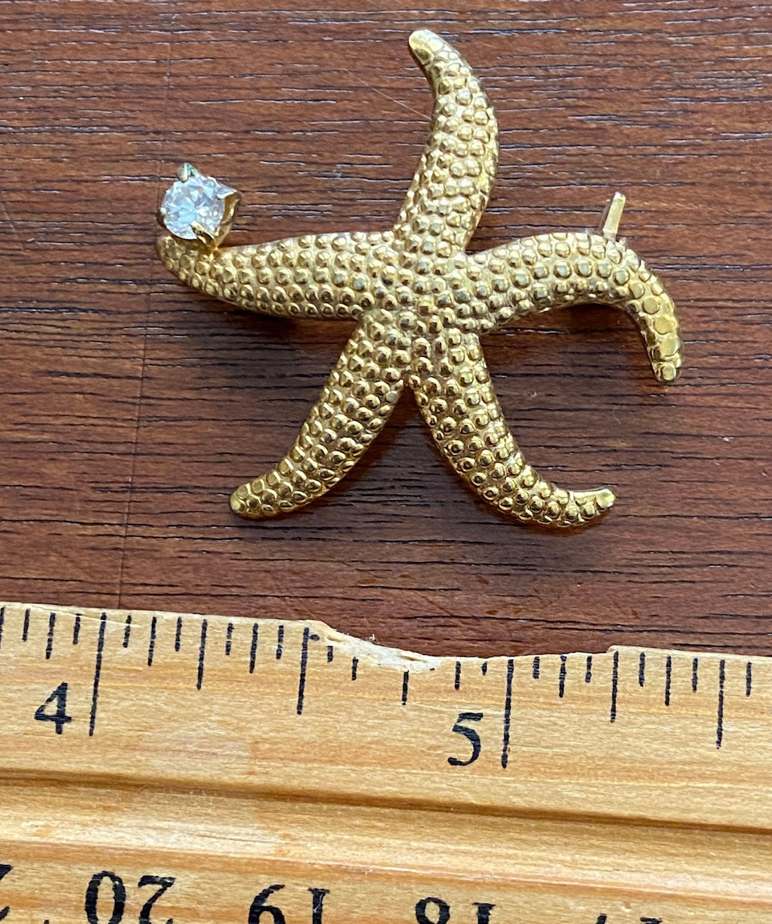 Gold Tone Metal Starfish with CZ Accent Brooch Pin