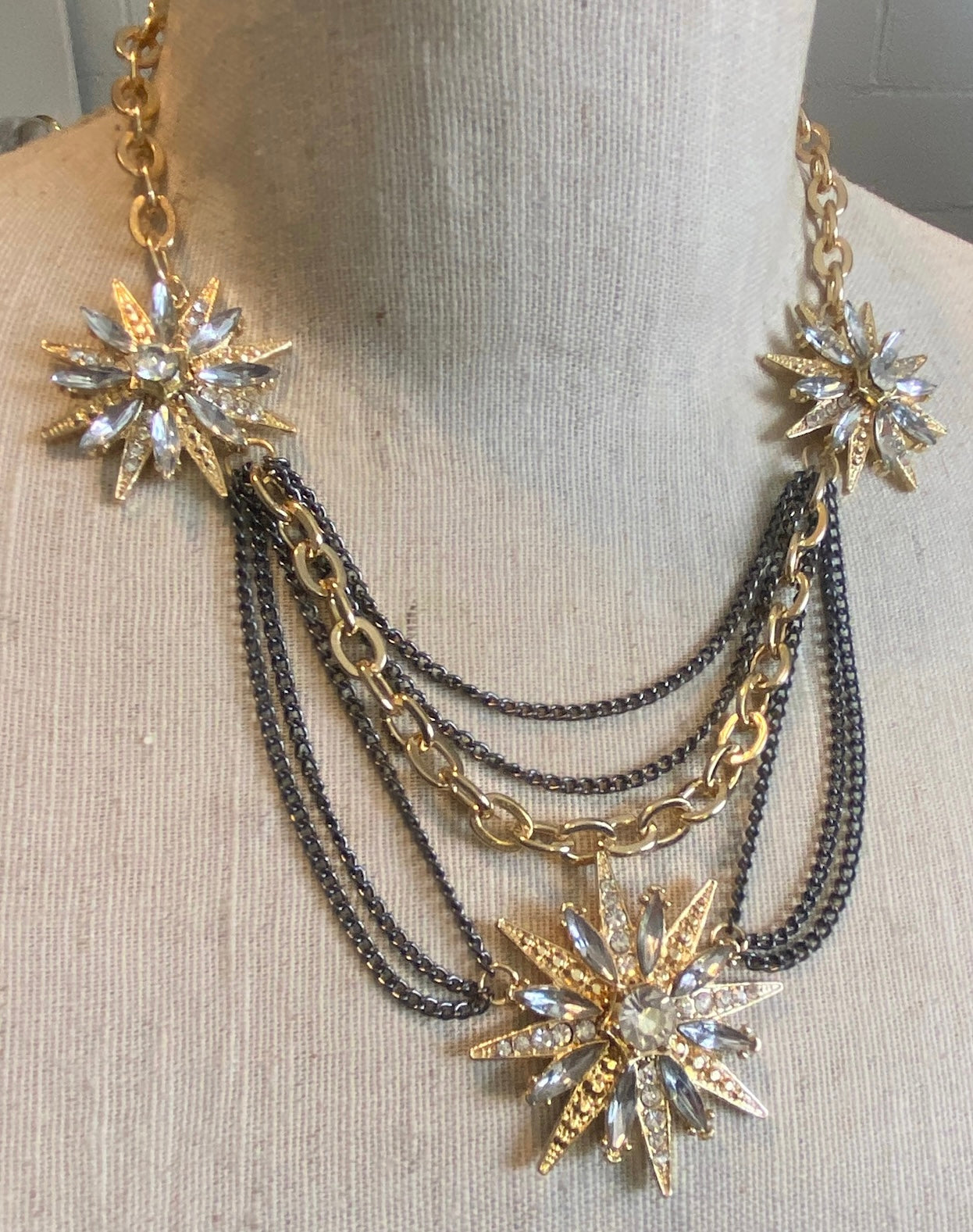 Festoon Gunmetal Gold Tone Metal Rhinestone Starburst Necklace