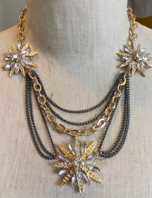 Festoon Gunmetal Gold Tone Metal Rhinestone Starburst Necklace